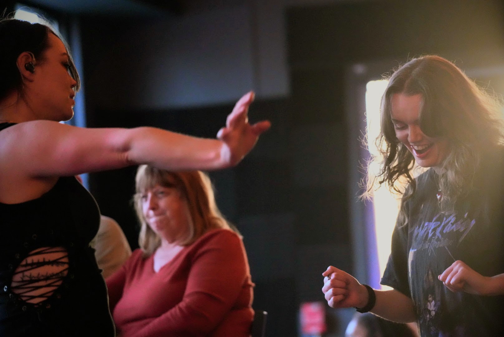 Vocalist dancing with fans